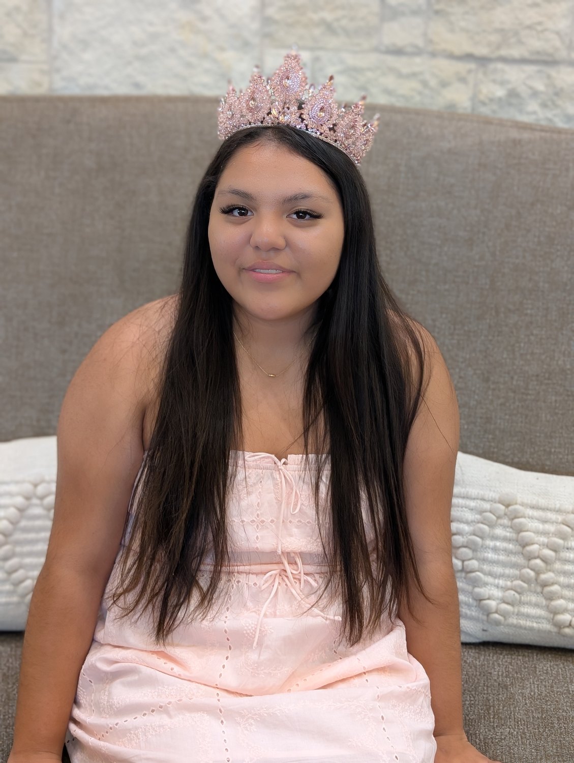 Lacey wearing her rose-pink quinceañera crown